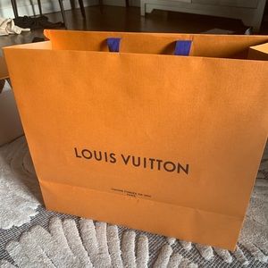 Mid size Louis Vuitton shopping bag